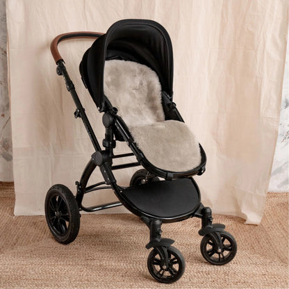 Baa Baby 100%  Merino Sheepskin Buggy Liner.  Designed to fit buggies such as the Bugaboo™ and with vertical openings which works with a 3 point or fixed 5 point harness.