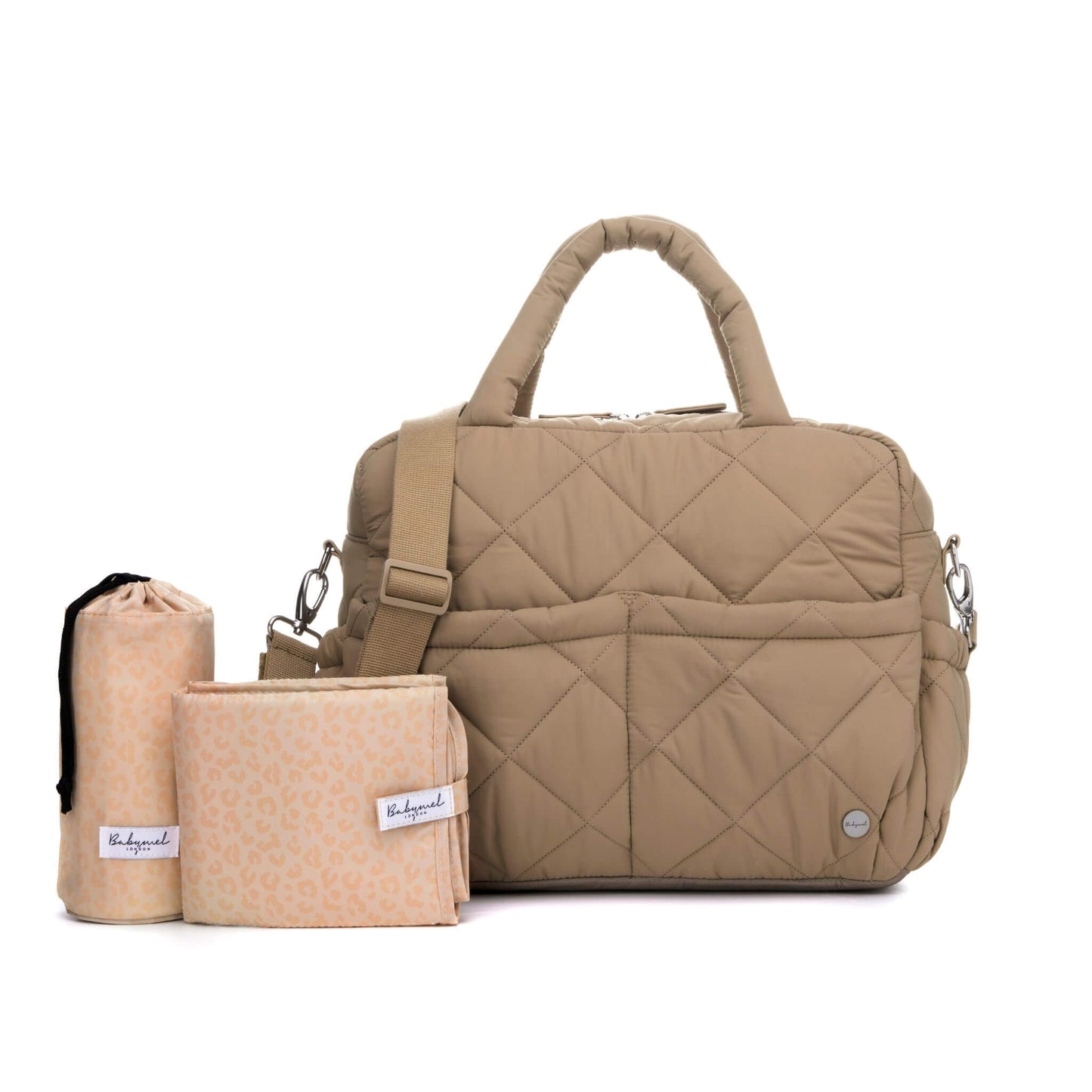 Soft quilted Babymel Willow Convertible Changing Bag in oatmeal, shown with matching padded changing mat and insulated bottle holder.