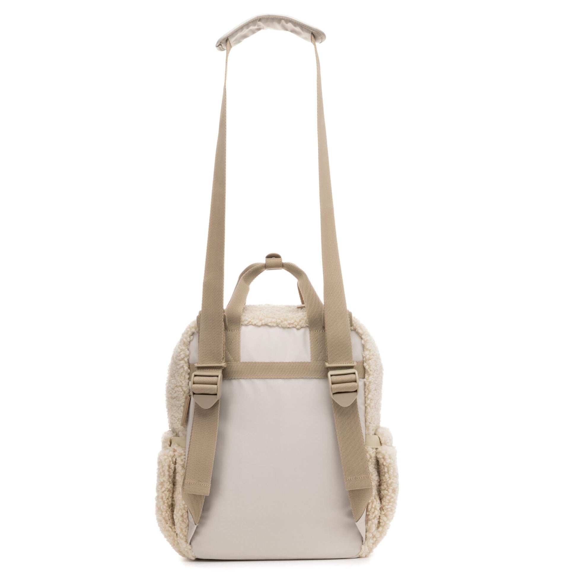 Cream Babymel Teddy Convertible Backpack with soft borg fleece, shown from the back with adjustable straps, a luggage sleeve, and a convertible shoulder strap.