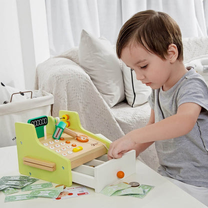 Child playing with the Classic World Cash Register, featuring wooden coins, banknotes, a credit card, and a working cash drawer.