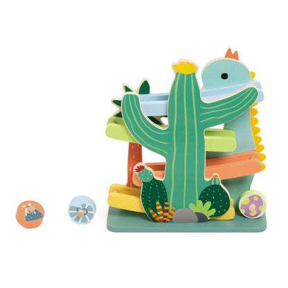 Back view of the Classic World Dinosaur Slide featuring a vibrant dinosaur, cactus design, colourful tracks, and wooden wheels.