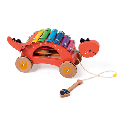 Classic World Dinosaur Xylophone with vibrant rainbow keys, pull-along wheels, wooden mallet, and playful design for music and fun.