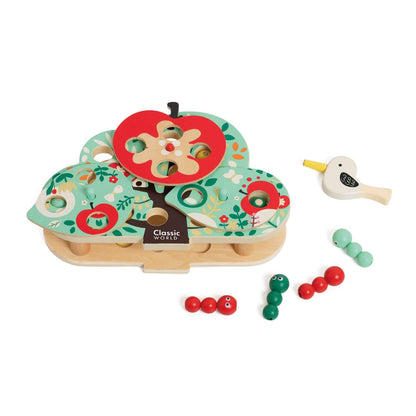 Classic World Doctor Woodpecker toy featuring a wooden apple tree, magnetic worms, and a bird tool with a magnetic beak.