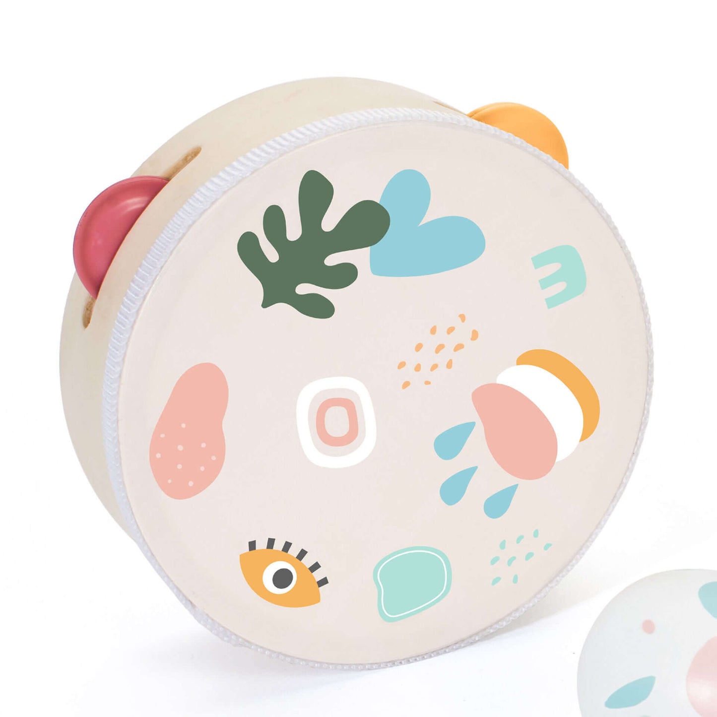 Close-up of the tambourine from the Classic World Iris Music Set, featuring playful patterns and soft pastel colours, perfect for kids.