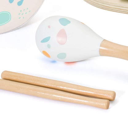 Close-up of the maraca and drumsticks from the Classic World Iris Music Set, featuring soft pastel colours.