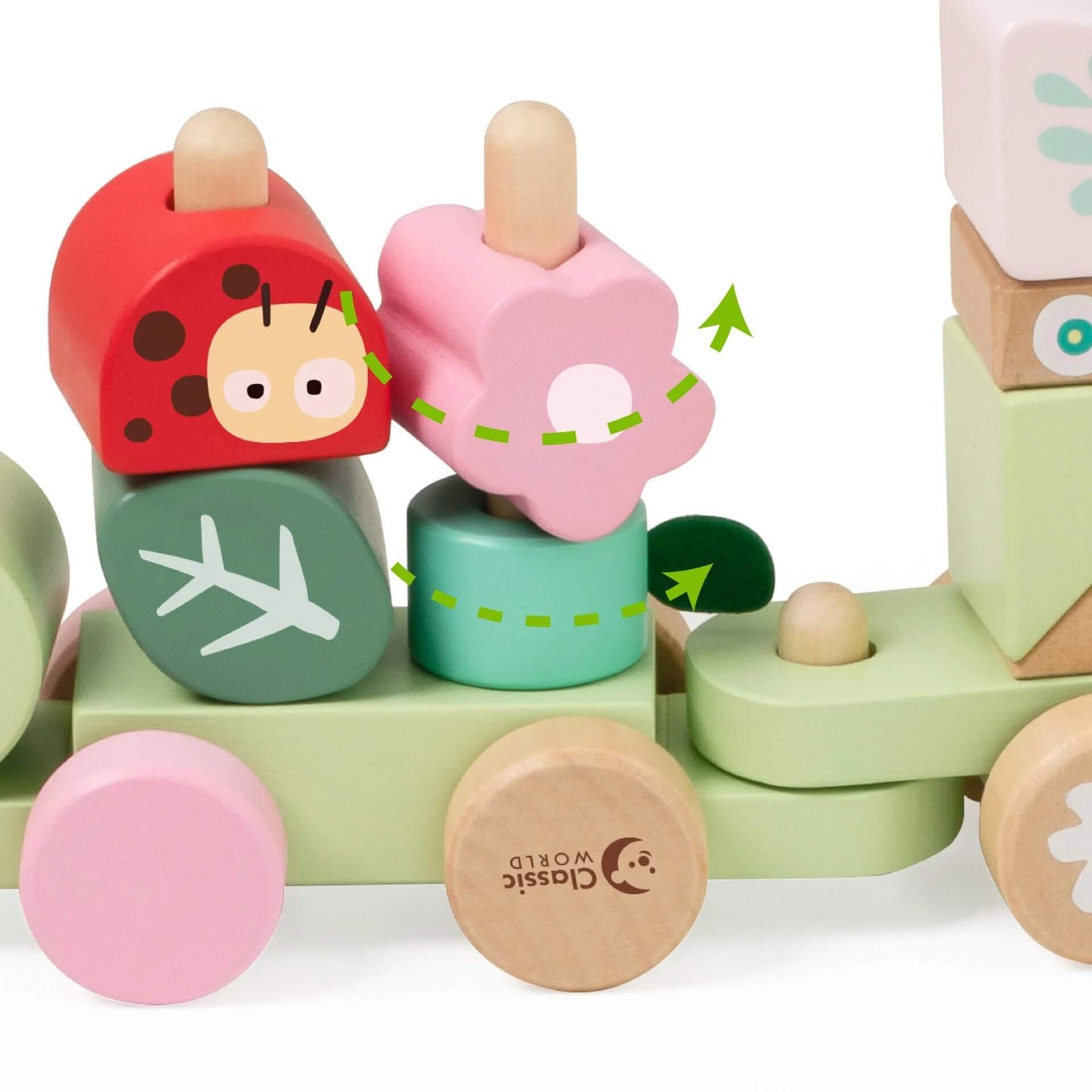 Close-up of the Classic World Pull Jungle toy, featuring stackable pastel blocks with a ladybird, flower, and leaf design for creative play.