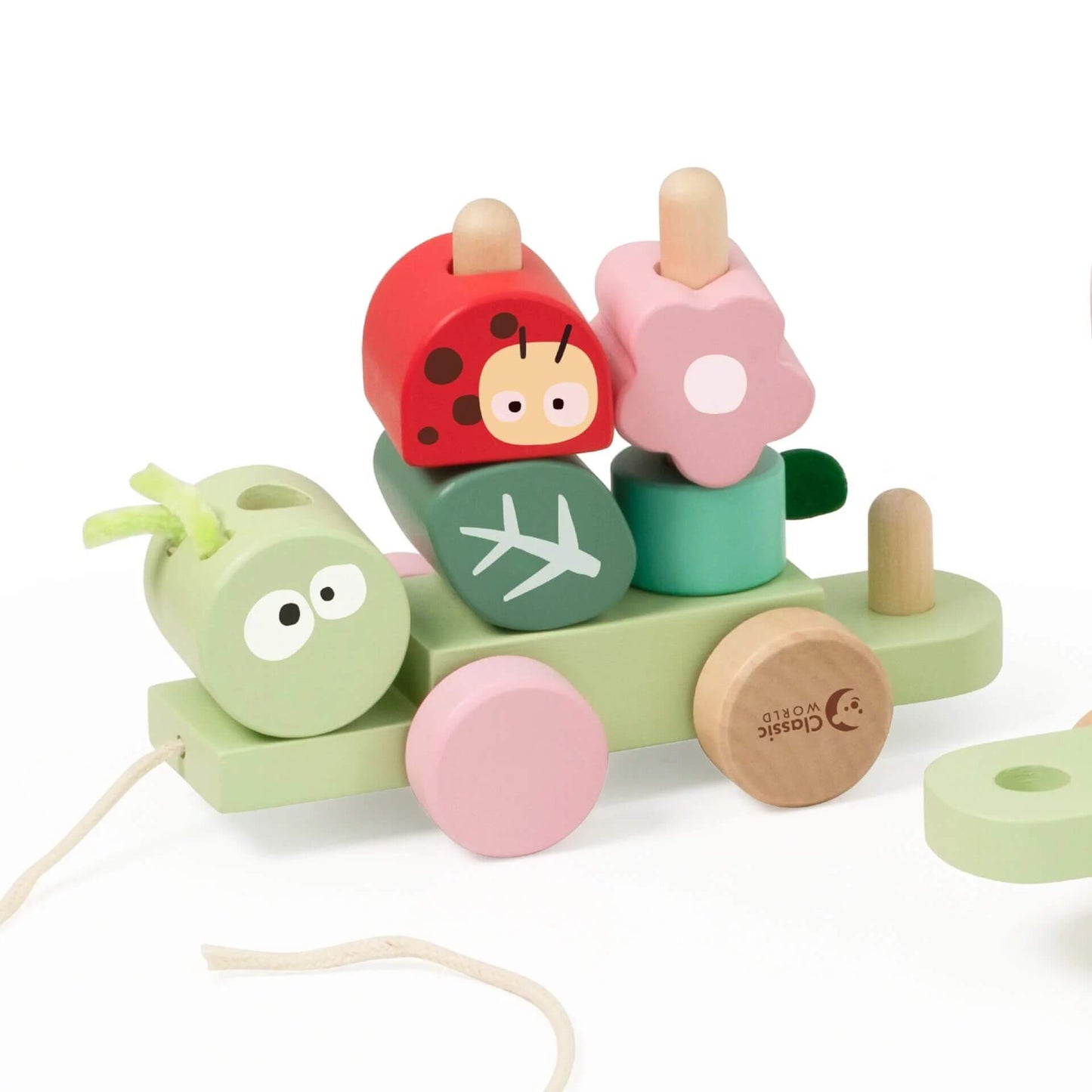 Classic World Pull Jungle toy featuring a caterpillar-shaped pull train with stackable pastel blocks, including a ladybird, flower, and leaf.