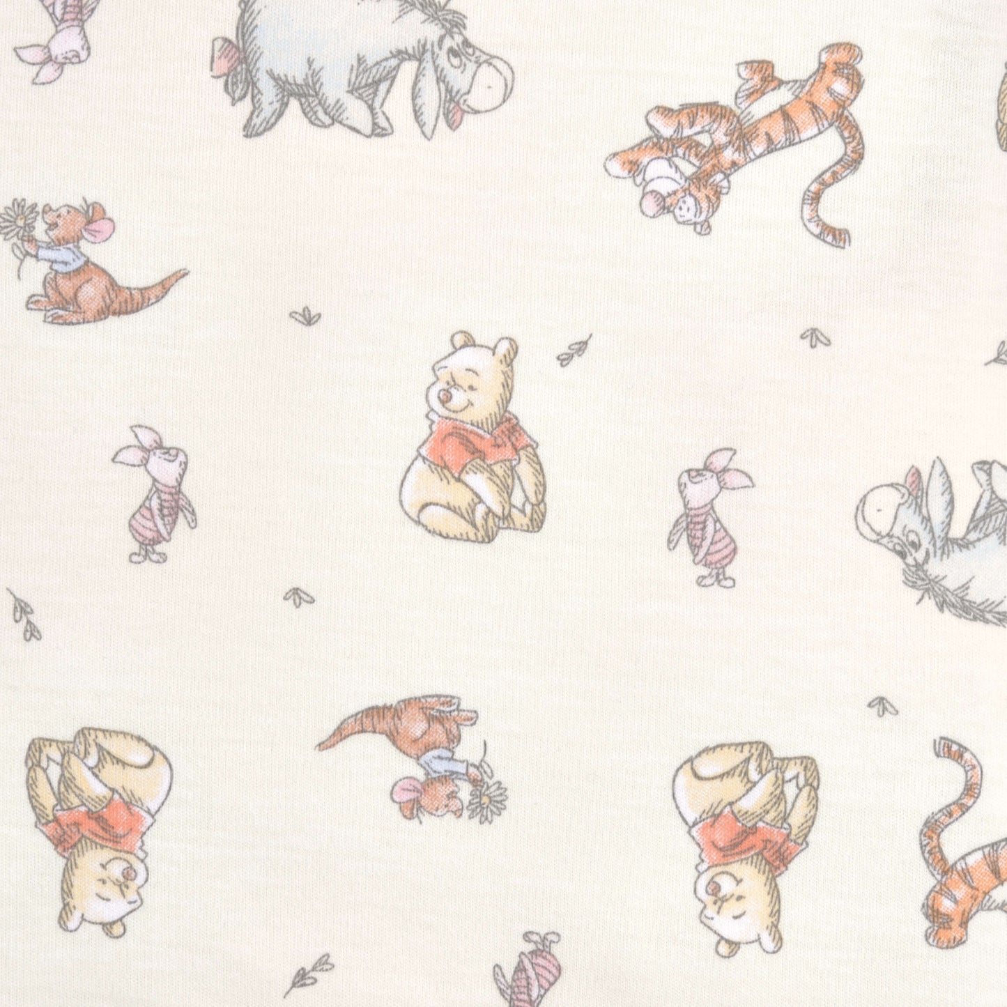 Detailed view of the lightweight 100% cotton fabric with Winnie the Pooh, Tigger, Eeyore, and Piglet characters in soft, gentle colours.