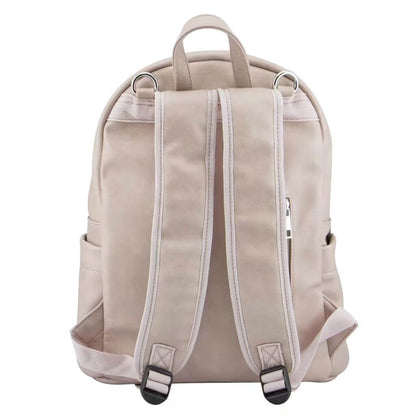 Back view of Isoki Marlo backpack in mushroom colour, featuring padded adjustable straps, soft leather-like material, and a sleek design.