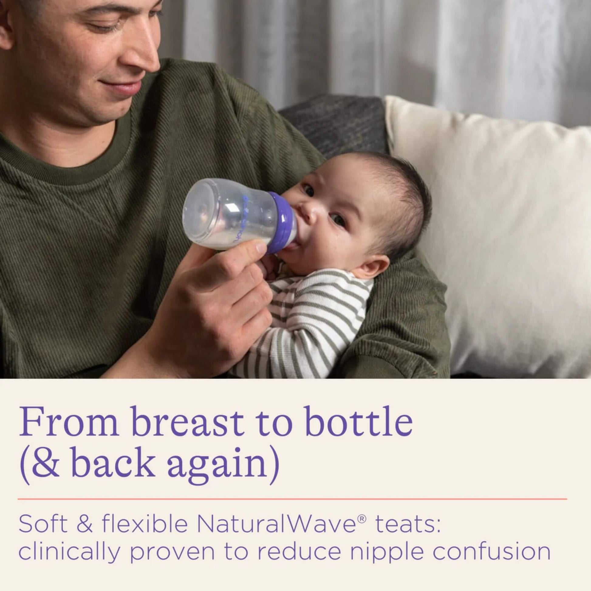 Father feeding baby with a Lansinoh bottle, emphasizing the NaturalWave® teats, designed to reduce nipple confusion and support easy transition between breast and bottle.