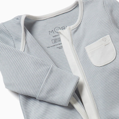 Close-up of the MORI Clever Zip Sleepsuit in blue stripe, showcasing the two-way front zip, long sleeves, and a small white chest pocket for added detail.