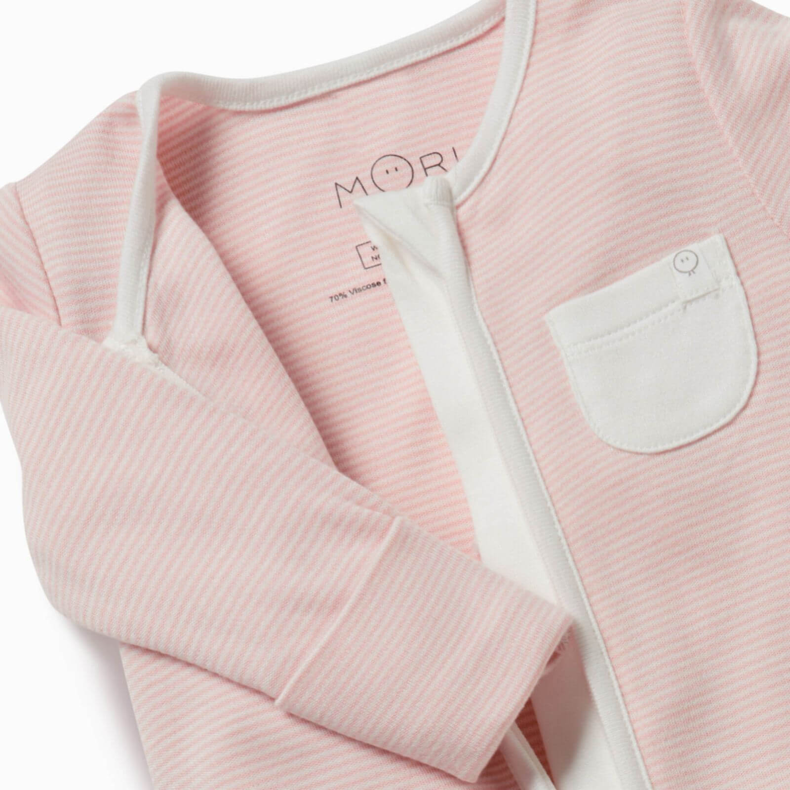 Close-up of the MORI Clever Zip Sleepsuit in blush stripe, showcasing the two-way front zip, long sleeves, and a small white chest pocket for added detail.