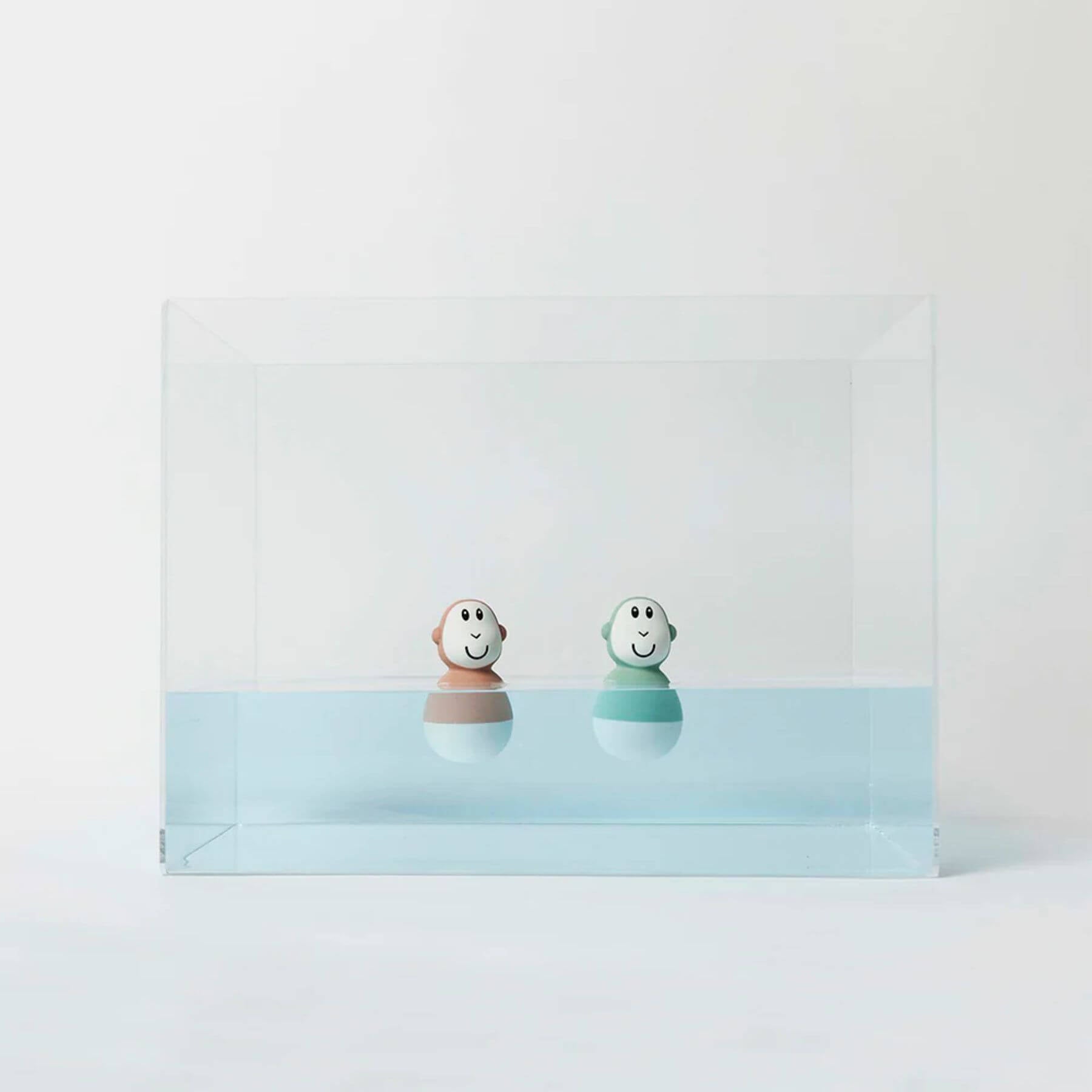 Matchstick Monkey bathtime  mint green and dusty pink wobblers floating in water, designed for sensory play and motor skill development, perfect for babies 6 months and older.