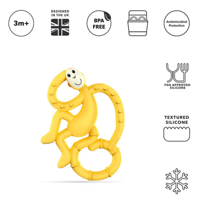 A yellow Matchstick Monkey mini teether featuring a monkey design with textured silicone. The teether is shown with UK design, BPA free, and antimicrobial protection icons.