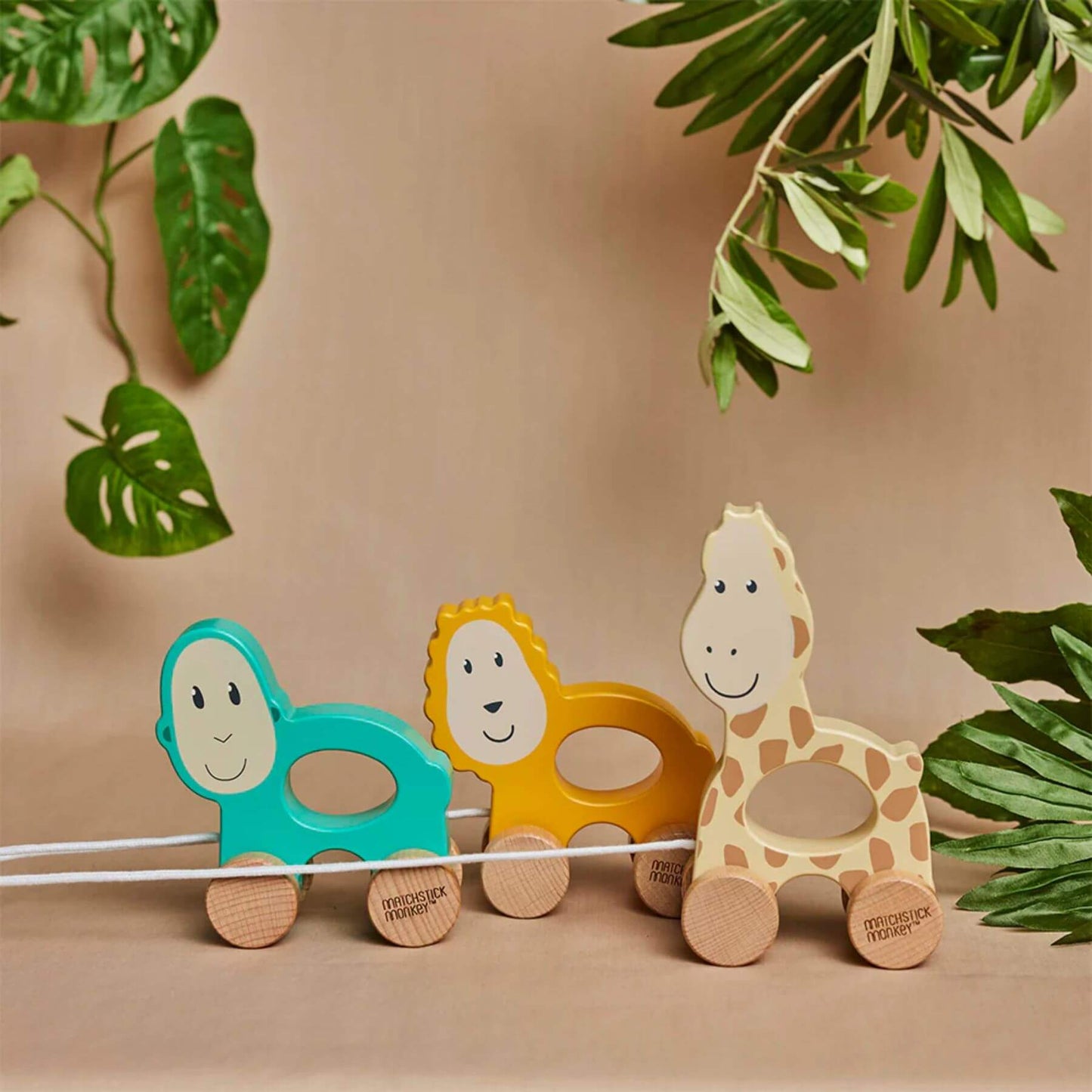 Matchstick Monkey wooden pull-along animal toys, designed for toddlers to boost motor skills, imaginative play, and crafted from eco-friendly materials.