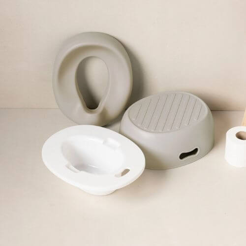 The Nattou 3-in-1 potty components displayed separately, including the step stool, seat reducer, and potty insert.