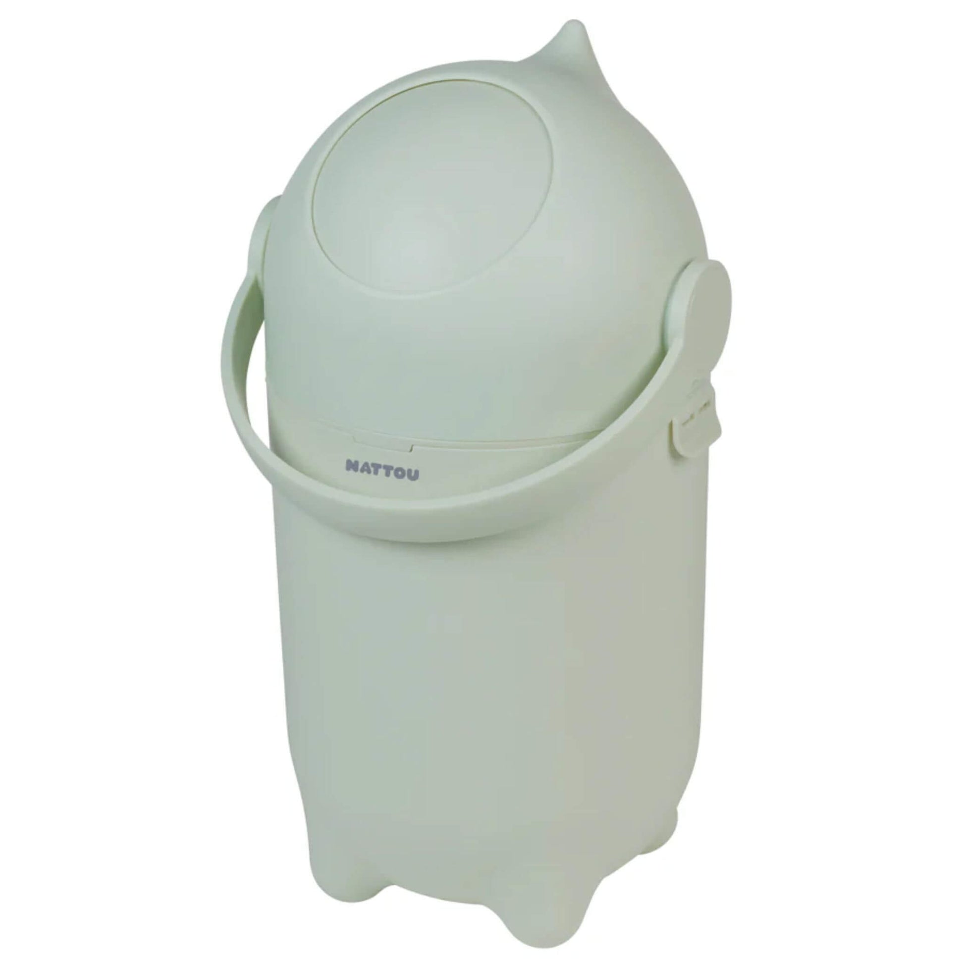 Green Nattou Dropy Nappy Bin with a rounded lid and handle, designed to lock in odours and complement a modern nursery.