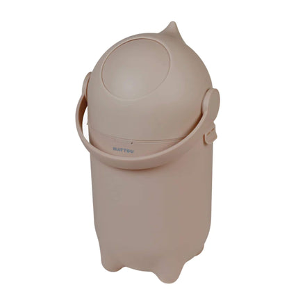 Taupe Nattou Dropy Nappy Bin with a rounded lid and handle, designed for odour control and a modern nursery look.