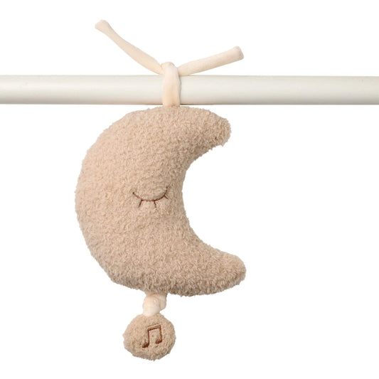 Soft Nattou Teddy Musical Cuddly in a moon shape, tied to a rail with a pull string to play a gentle melody.