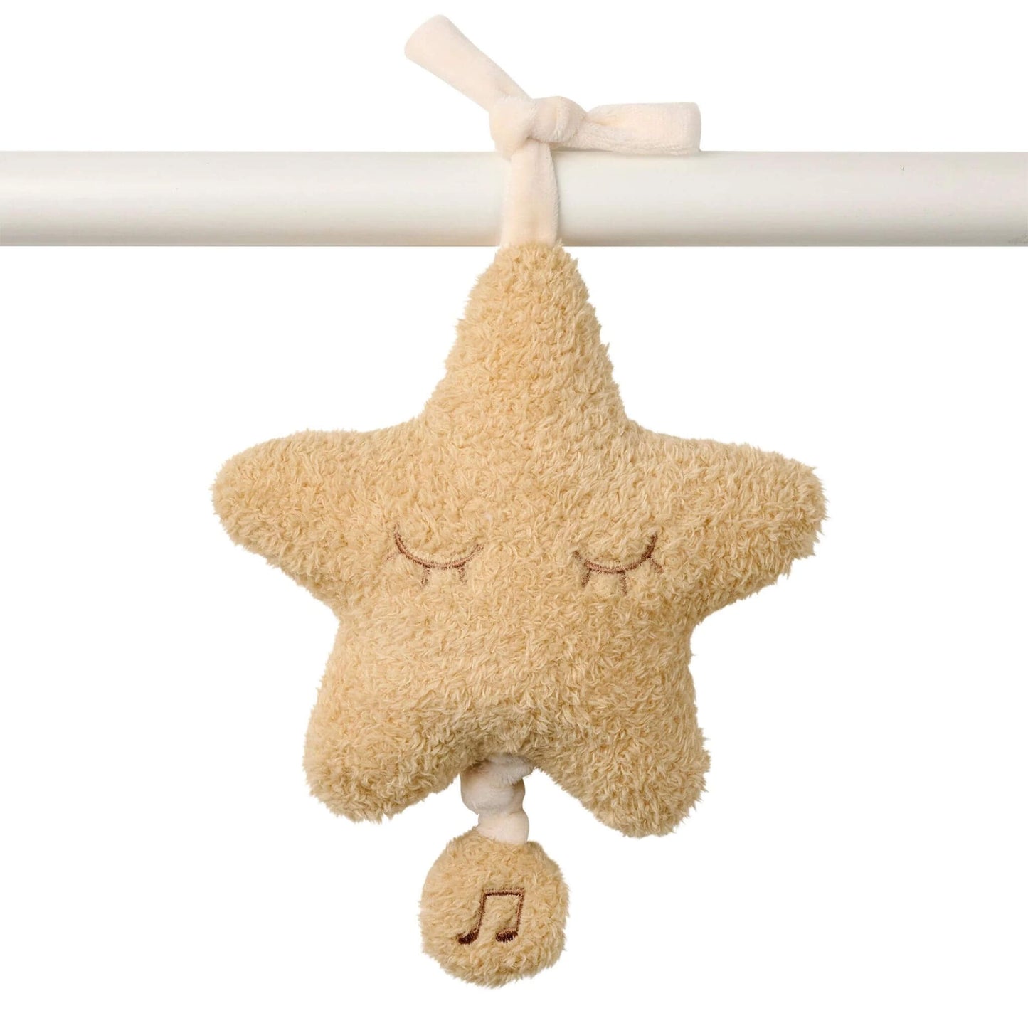 Soft plush star-shaped musical toy with embroidered sleepy eyes, tied to a cot bar with fabric straps.