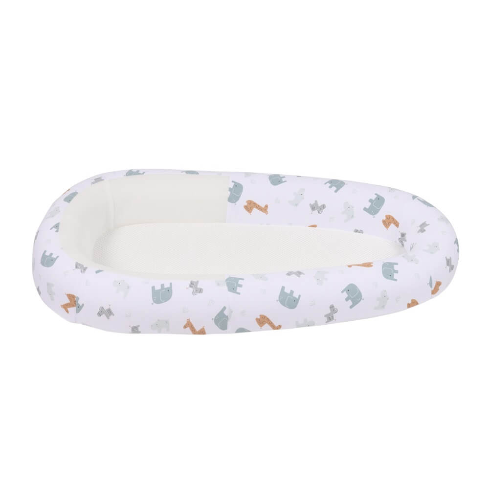 Purflo Sleeptight Baby Bed in Animal Safari design, featuring a white cover with elephants and giraffes. Provides a soft, breathable, and safe sleep space for baby.