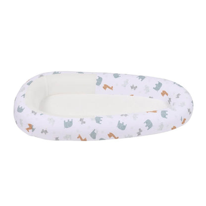 Purflo Sleeptight Baby Bed in Animal Safari design, featuring a white cover with elephants and giraffes. Provides a soft, breathable, and safe sleep space for baby.