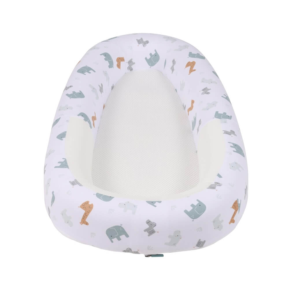 Purflo Sleeptight Baby Bed in Animal Safari print, featuring a cosy white cover with elephants, giraffes, and zebras. Designed to provide a safe, breathable sleep space.