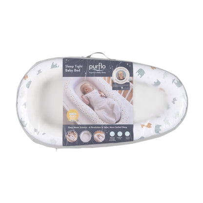 Purflo Sleeptight Baby Bed in Animal Safari packaging, featuring a cosy baby bed with a white cover decorated with elephants and giraffes. Promotes safe, comfortable sleep.