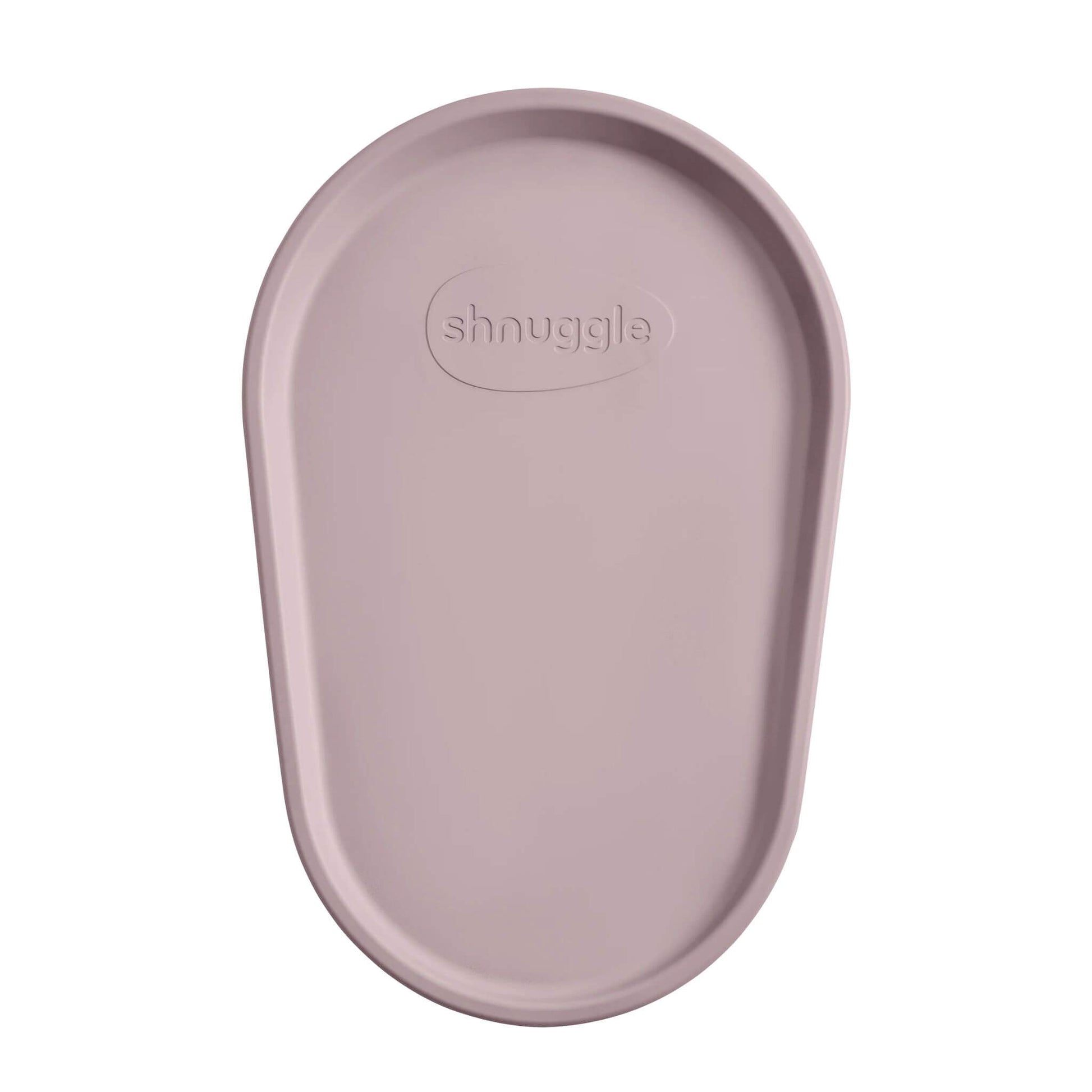 Close-up view of Shnuggle Squishy Changing Mat in blossom colour displaying ergonomic oval design and textured non-slip surface with brand logo.