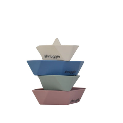 Stacked Shnuggle Stack ‘n’ Sail Bath Boat Toys, showcasing the fun, stackable design ideal for bath-time play.