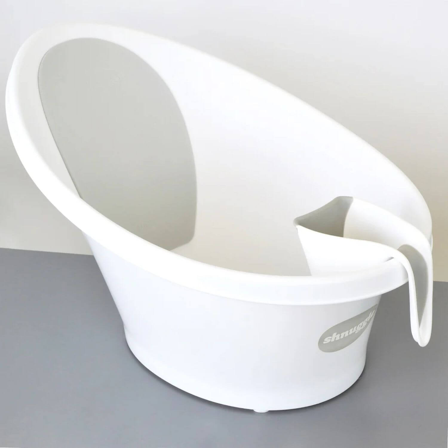 White Shnuggle baby bath with matching Washy bath jug attached