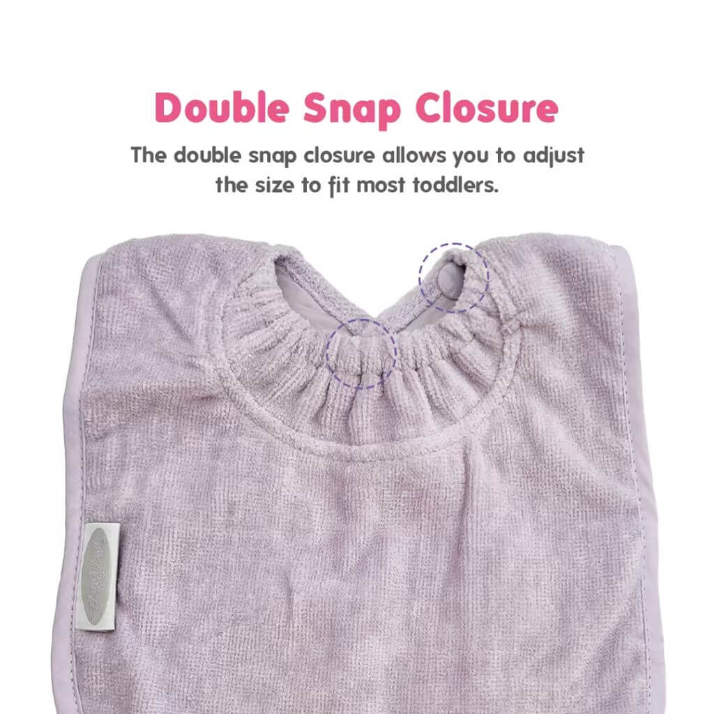 Silly Billyz Towel Large Bib in lavender, featuring a double snap closure for adjustable fit, absorbent towel front, and waterproof backing.