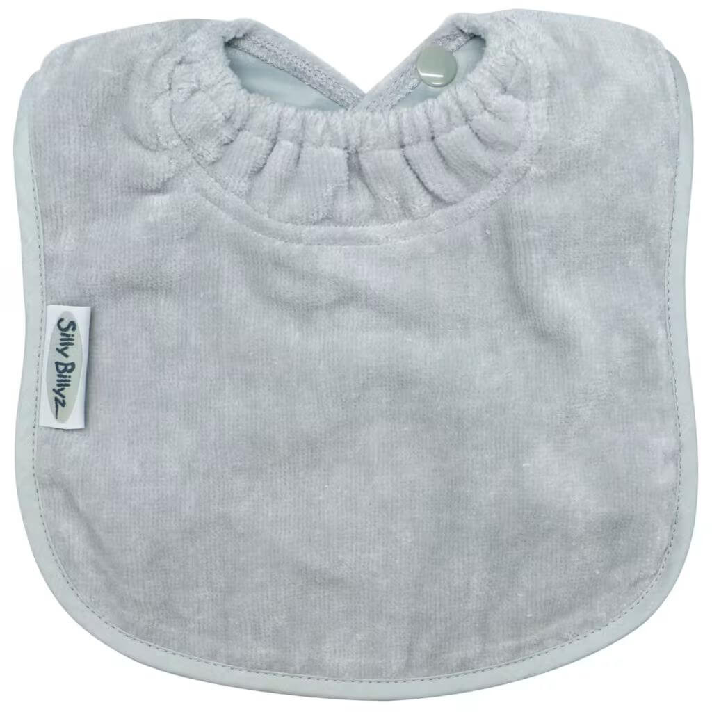 Silver Silly Billyz Towel Large Bib, featuring a soft absorbent front, waterproof backing, and snap neck closure.