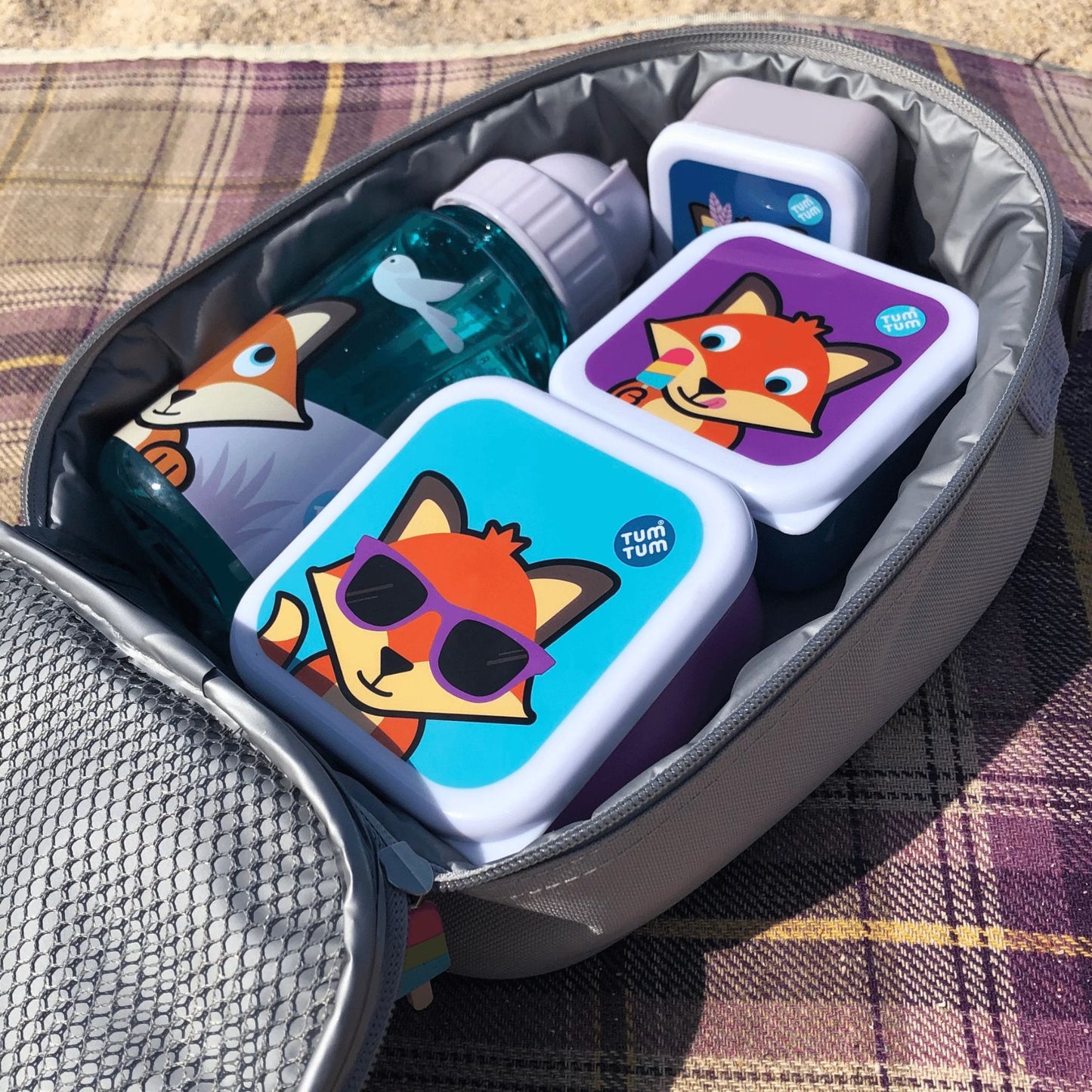 TUM TUM Felicity Fox Nesting Snack Pots and water bottle packed inside a lunch bag, perfect for children's snacks and meals on the go.