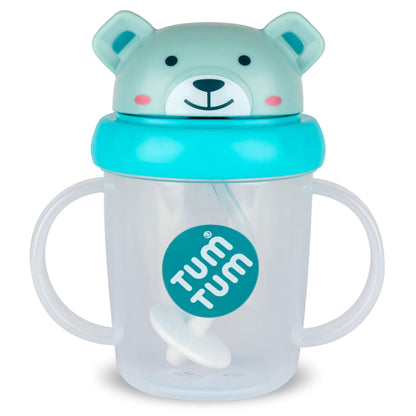 A clear Series 3 TUM TUM Tippy Up Cup, featuring a cute Blue bear lid with handles on both sides for easy gripping. The cup includes a weighted straw that follows the liquid, allowing toddlers to drink comfortably from any angle.