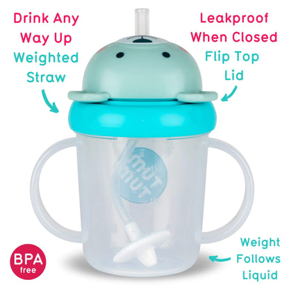 A TUM TUM Tippy Up Cup featuring a blue bear design with a flip-top lid for easy access. The cup includes a weighted straw that follows the liquid, making it easy to drink from any angle. It’s BPA-free, leakproof when closed, and designed with easy-grip handles for toddlers.