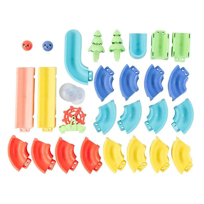 Tiger Tribe Marble Waterslide ECO components, including colourful track pieces, marbles, trees, and suction cups, designed for fun, eco-friendly bath play.