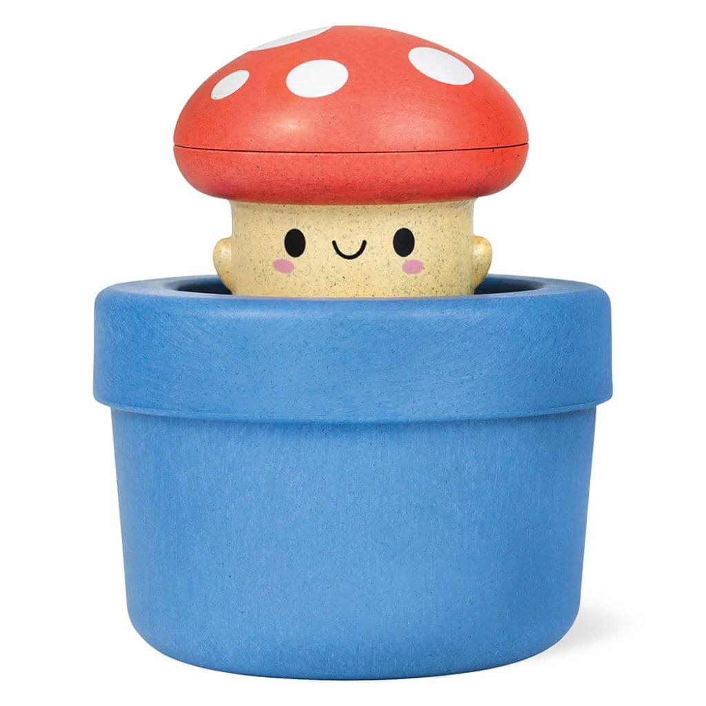 Tiger Tribe bath pop-up mushroom toy in blue pot with red cap, ideal for sensory play and eco-friendly bath fun for young children.