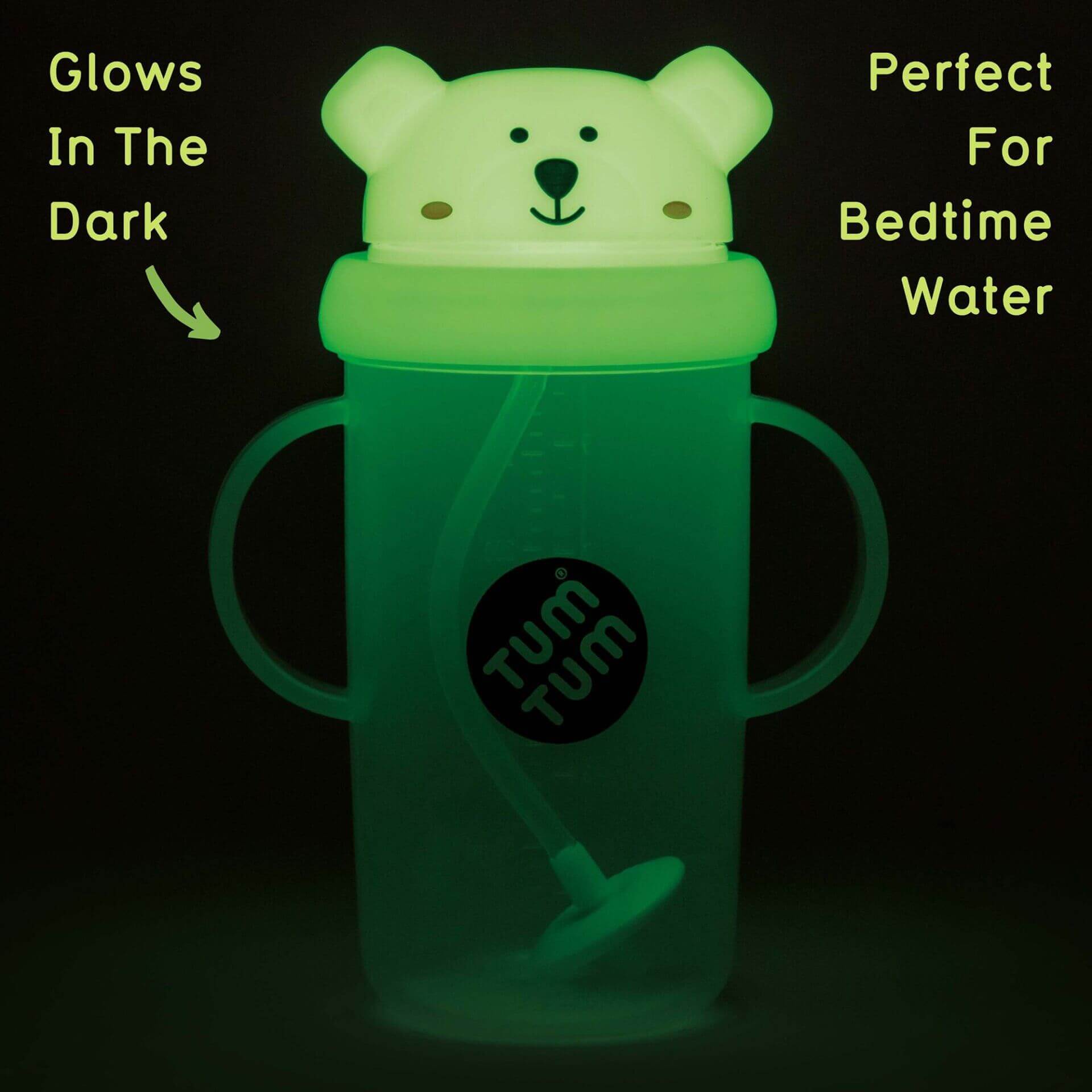 A glow-in-the-dark TUM TUM sippy cup with a polar bear lid, perfect for bedtime water. It features a weighted straw that follows the liquid and has easy-grip handles, perfect for use in the dark.