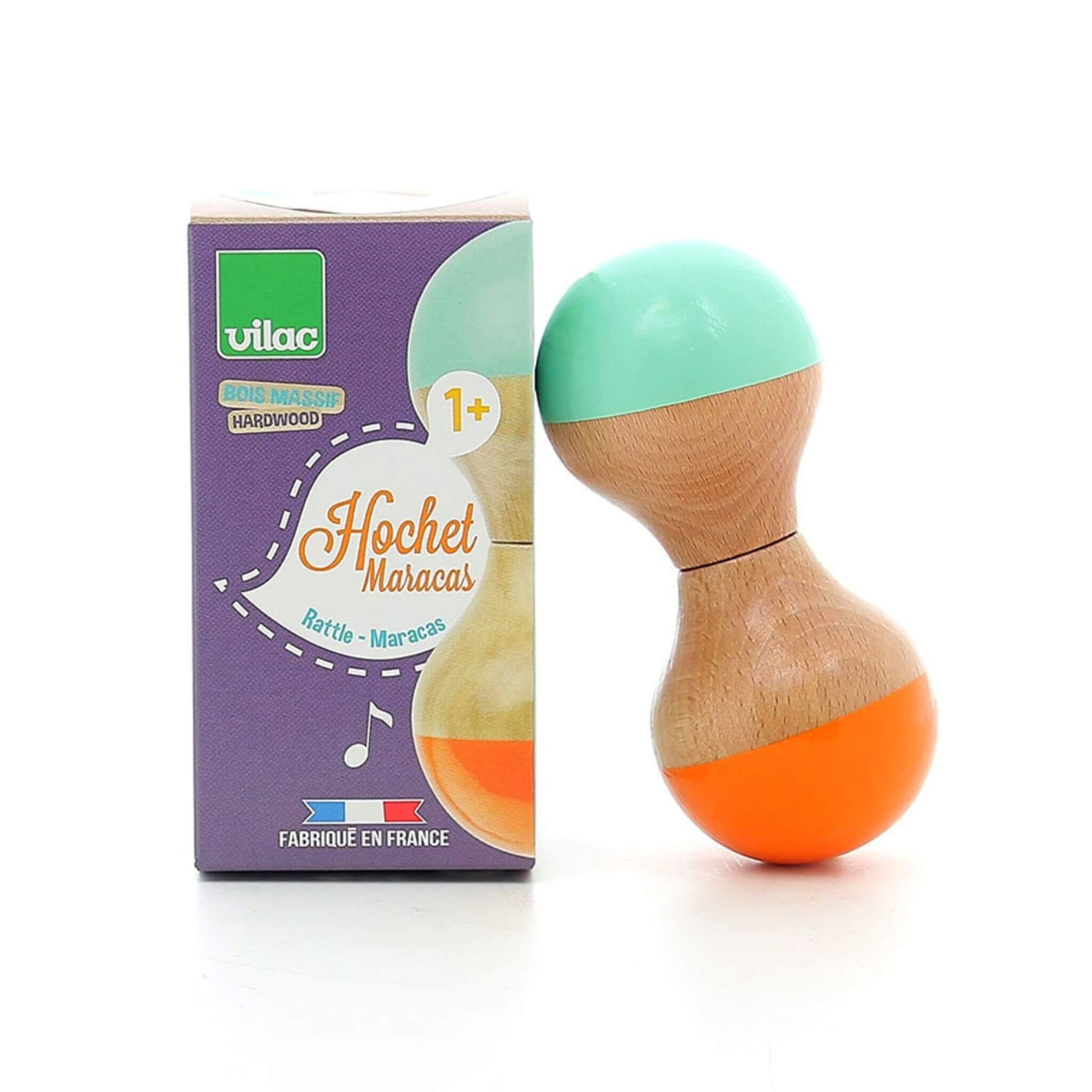 Vilac mint and orange wooden maraca displayed next to its packaging, which features a purple design with musical notes and age recommendation of 1+.