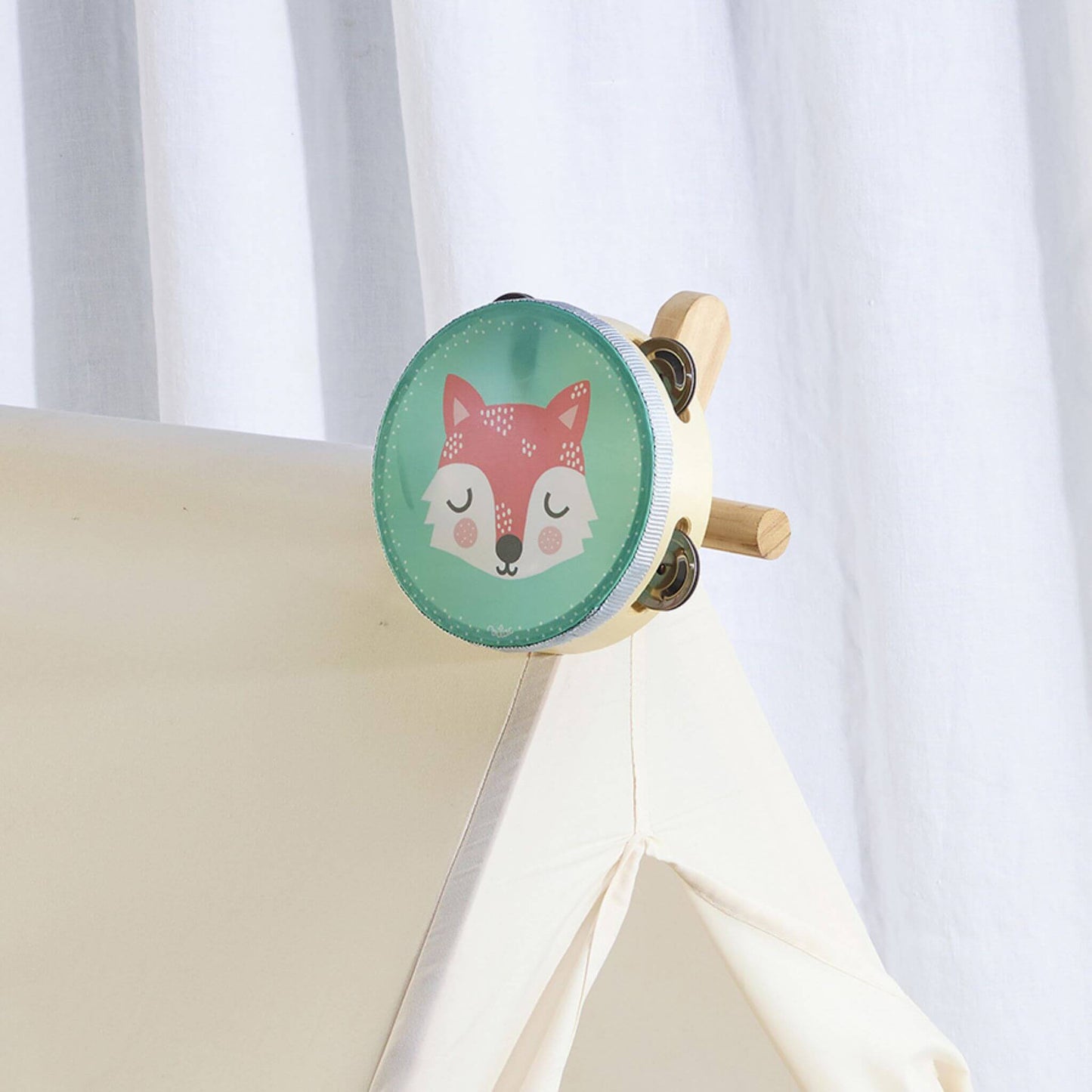 Vilac Fox Wood Tambourine with a fox illustration displayed on a play tent