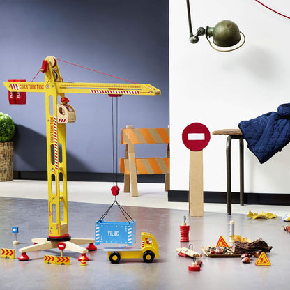 Vilac large wooden crane set in a realistic play scene, featuring accessories.