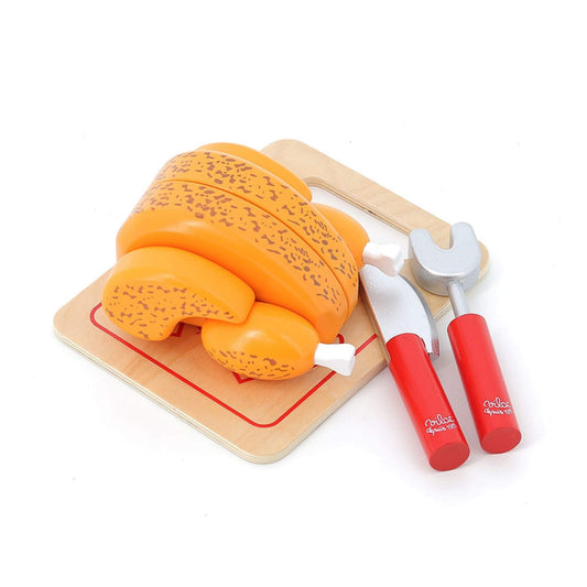 Wooden Vilac Roast Chicken to Cut set with velcro sections, carving tools, and board, perfect for imaginative play and motor skill development.