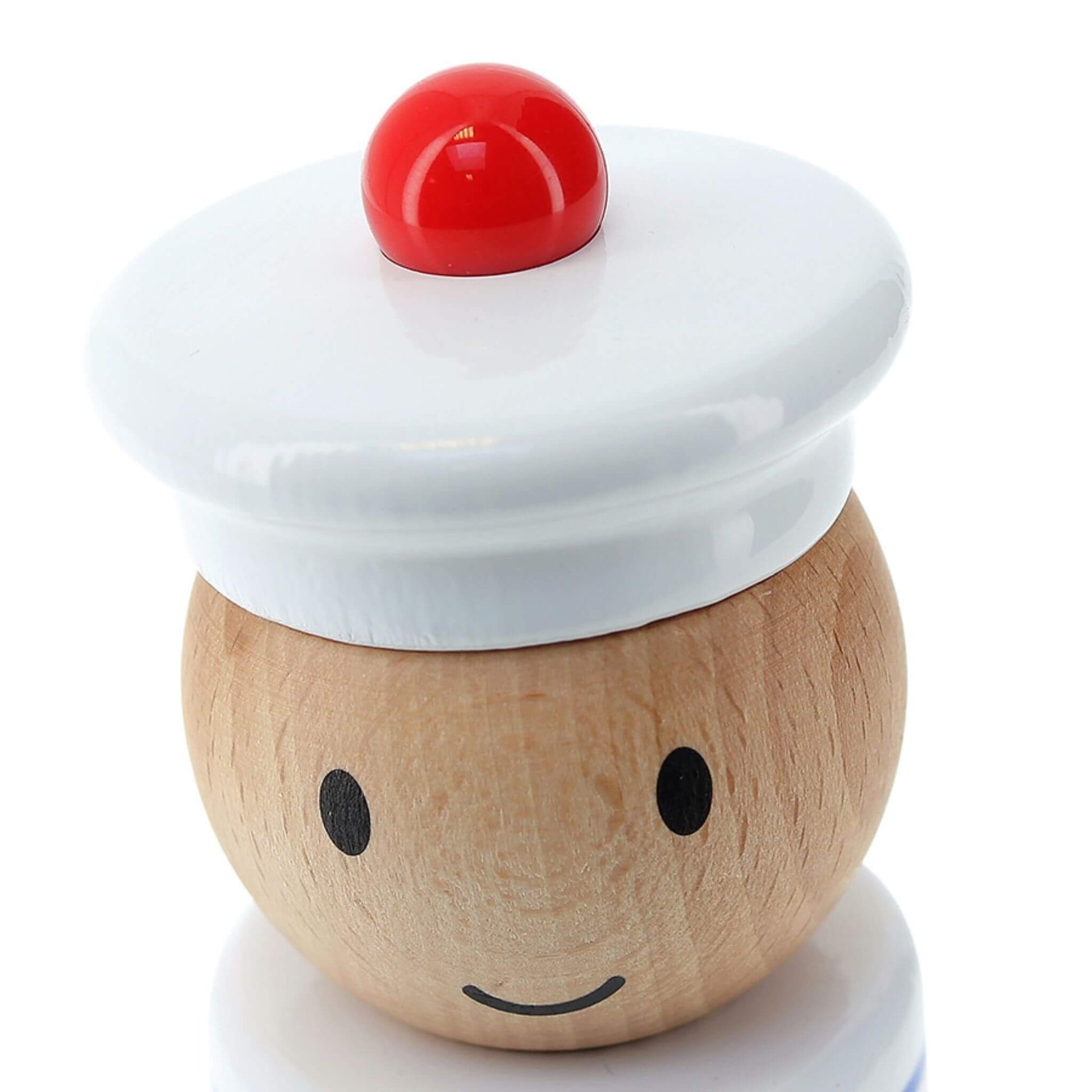 Close-up of the smiling wooden sailor head from the Vilac Sailor Stacking Toy, featuring a french sailor's cap