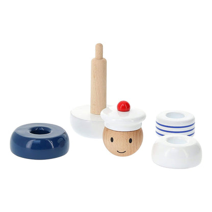 Wooden sailor stacking toy with disassembled navy blue, white, and striped rings, a smiling sailor head with a cap, and a central wooden rod. Perfect for fine motor skills and imaginative play.