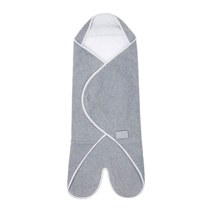 Purflo Cosy Wrap in Minimal Grey, a soft and breathable baby travel blanket, ideal for keeping infants snug and secure.